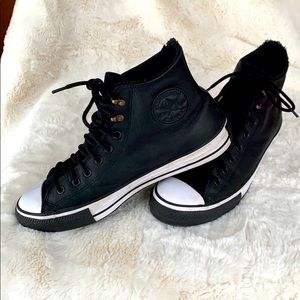 Leather high top converse sneakers
